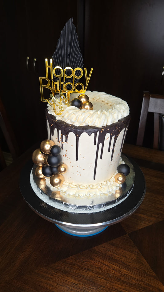 6in Round Black and Gold Drip Barrel Cake